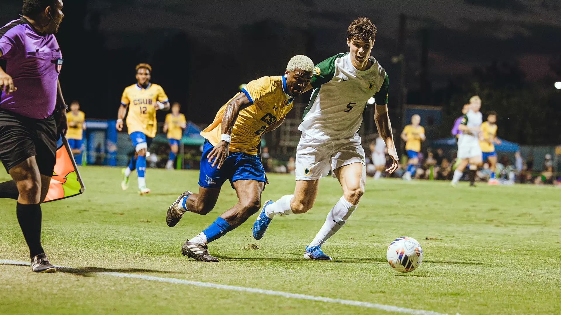 A CSU Bakersfield player on the ball in a match